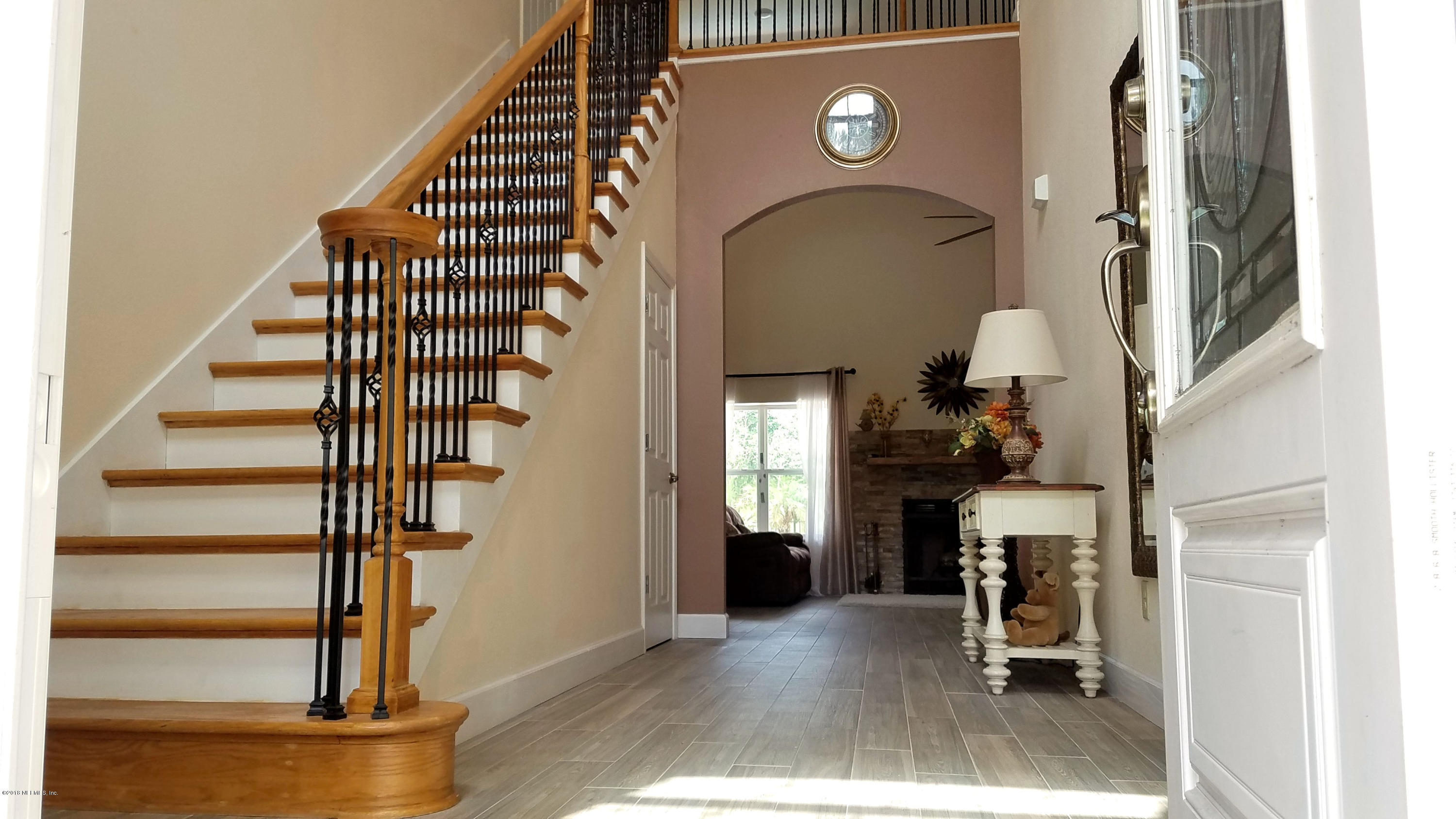 1205 Marlee Road St. Johns, FL 32259 - Photo 3 of 36 a view of entryway and hall with wooden floor