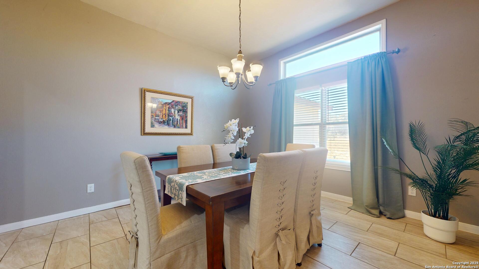 3992 Fm 1784 Pleasanton, TX 78064 - Photo 16 of 38 a dining room with furniture and window