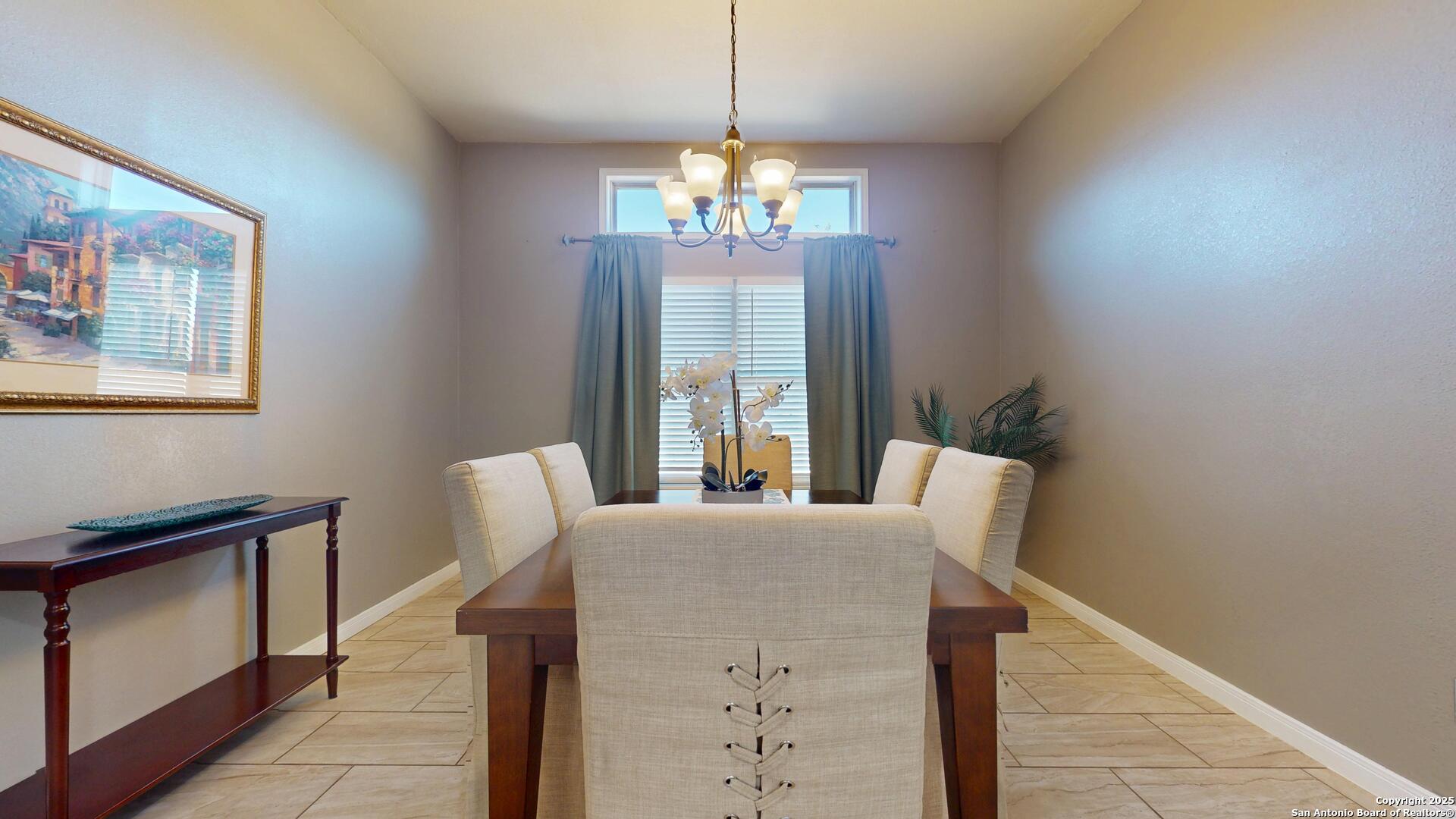 3992 Fm 1784 Pleasanton, TX 78064 - Photo 17 of 38 a dining room with furniture and window