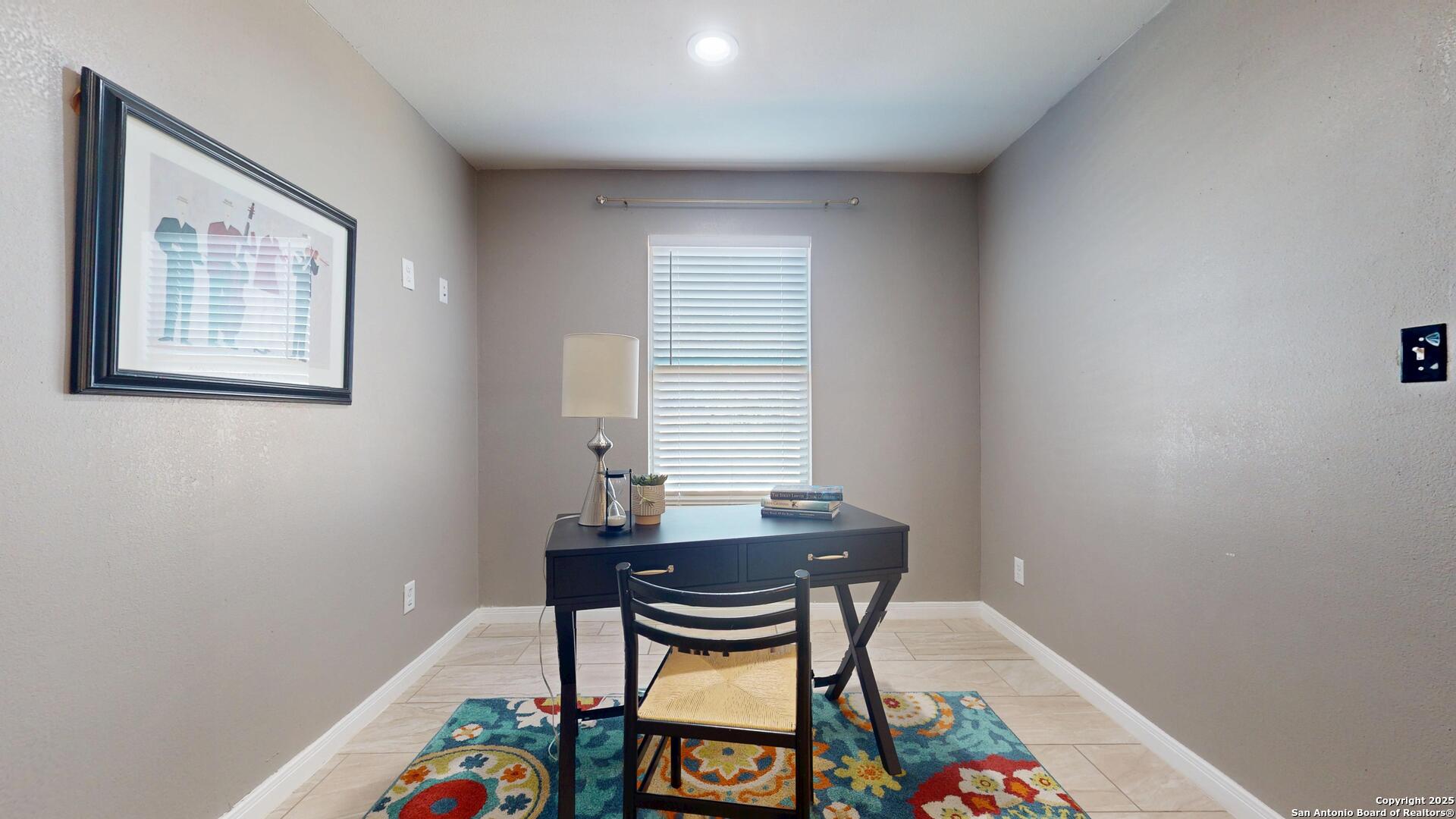 3992 Fm 1784 Pleasanton, TX 78064 - Photo 25 of 38 a dining room with a table and chairs