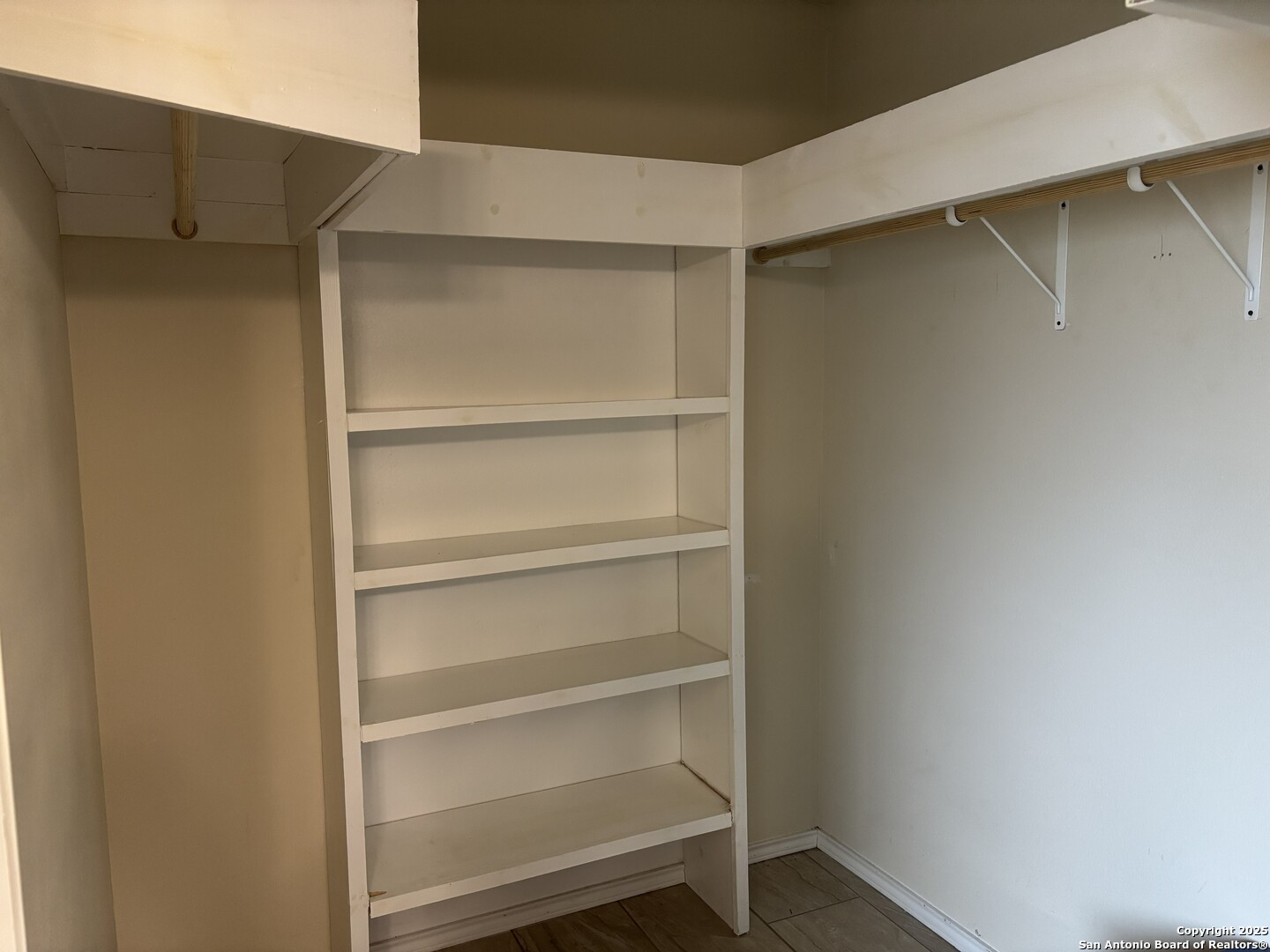 3992 Fm 1784 Pleasanton, TX 78064 - Photo 26 of 38 a view of walk in closet with empty racks