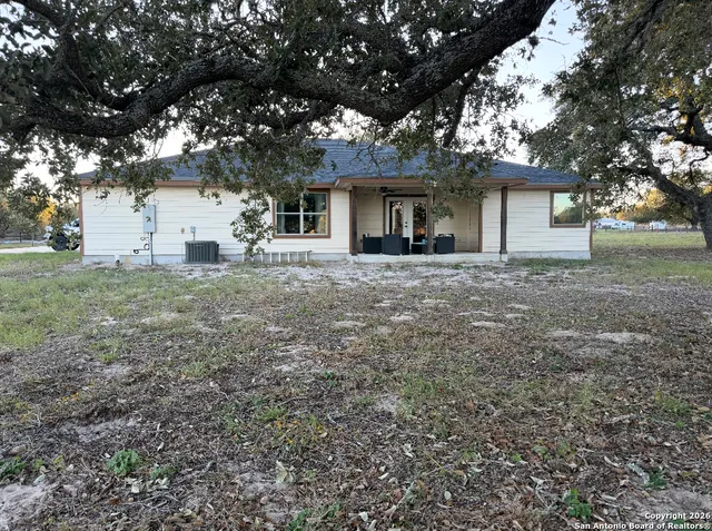 a view of a house with basketball ground