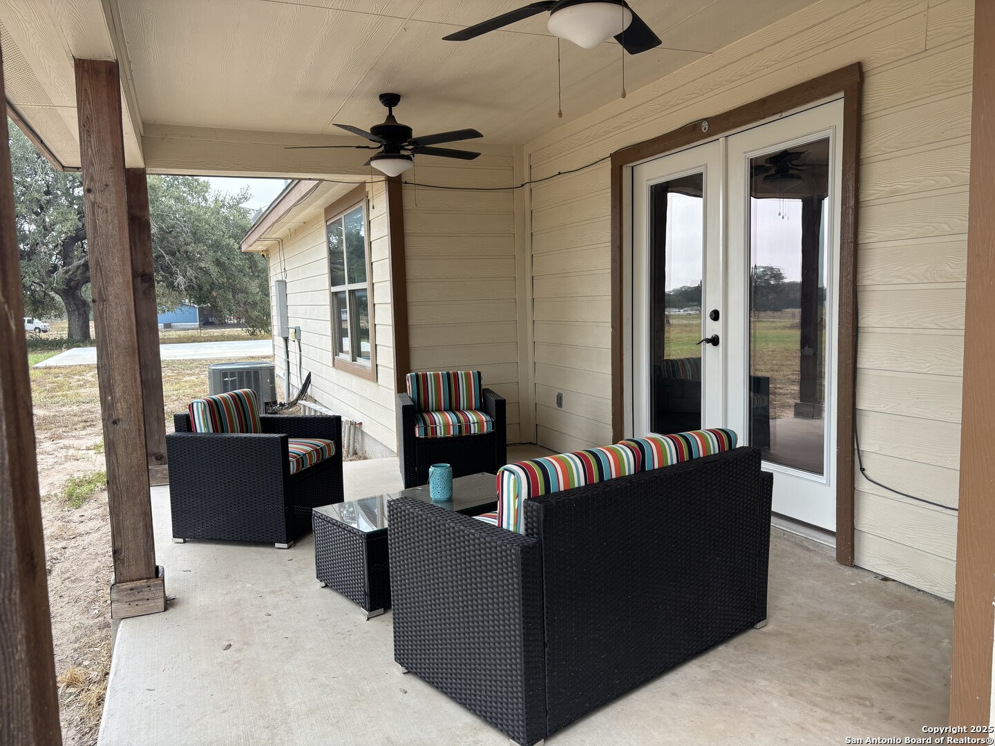 3992 Fm 1784 Pleasanton, TX 78064 - Photo 29 of 38 a living room with furniture and a large window