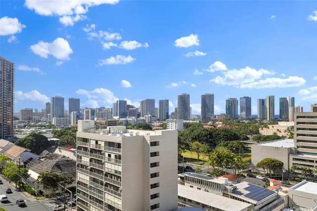 a view of a city with tall buildings