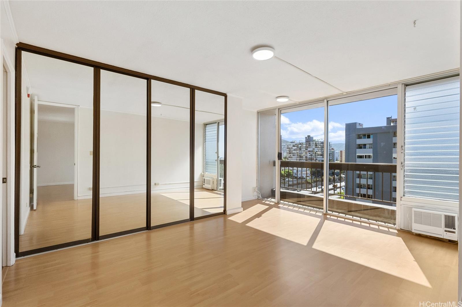 775 Kinalau Place, Unit 1003 Honolulu, HI 96813 - Photo 6 of 25 a view of an empty room with a window