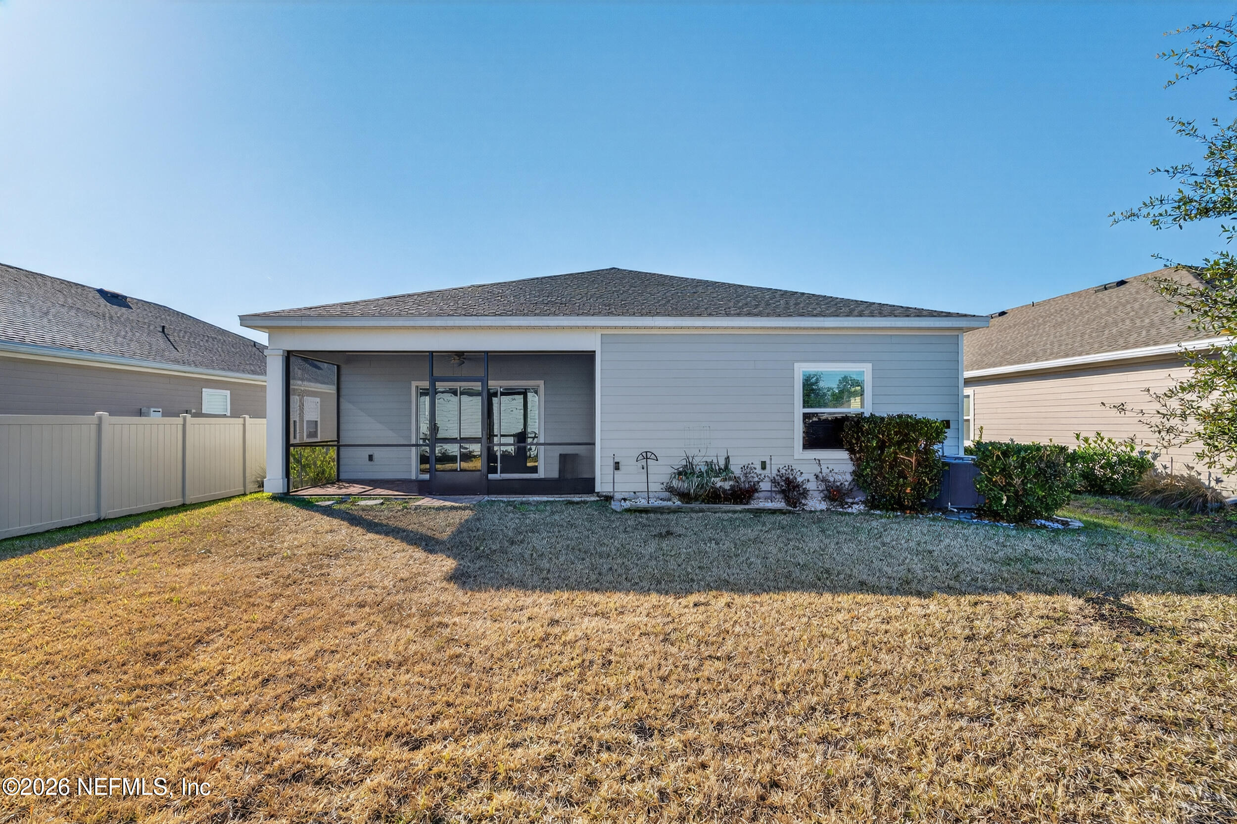 32 Ren Way St. Johns, FL 32259 - Photo 40 of 57 a front view of a house with garden and porch