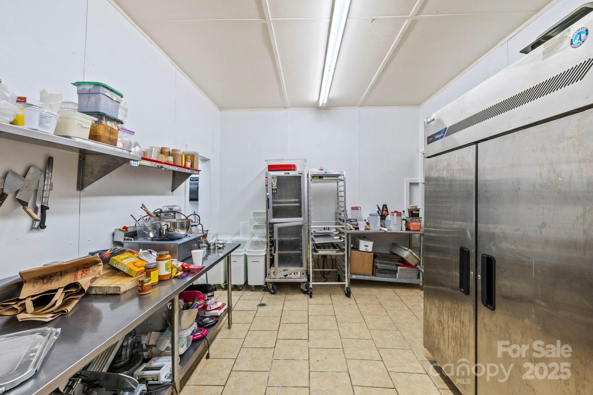 1196 North Country Club Road Brevard, NC 28712 - Photo 15 of 48 a room with furniture a air conditioner and a window