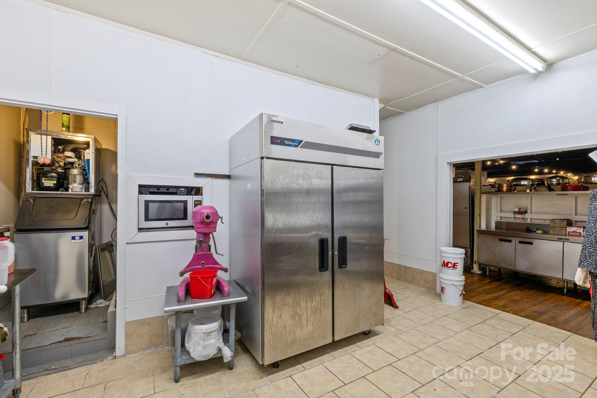 1196 North Country Club Road Brevard, NC 28712 - Photo 17 of 48 a room with storage and utility