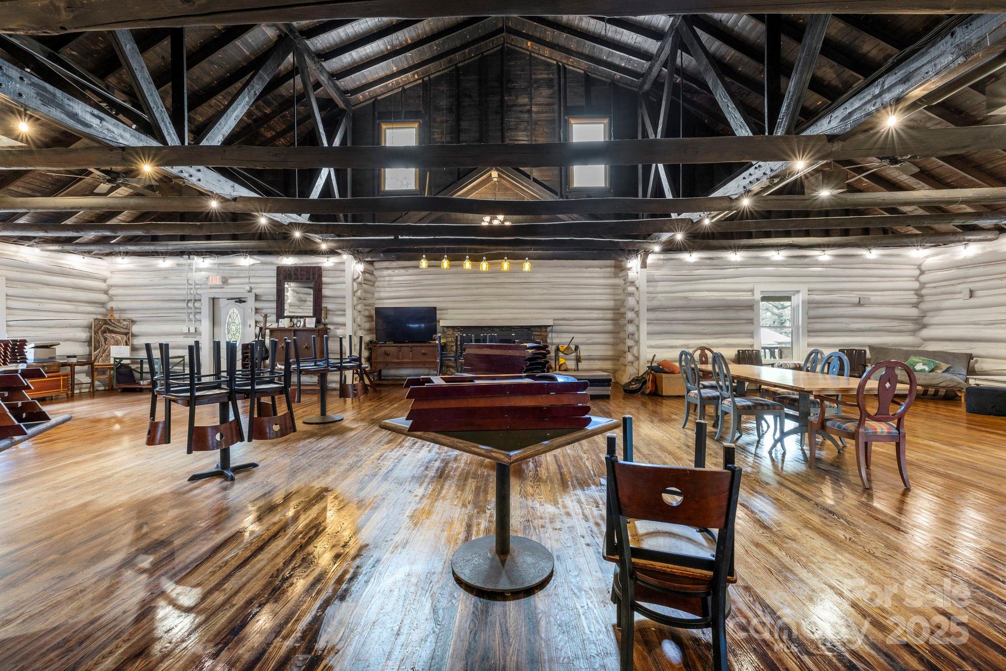 1196 North Country Club Road Brevard, NC 28712 - Photo 2 of 48 a living room with stainless steel appliances kitchen island granite countertop lots of wooden furniture