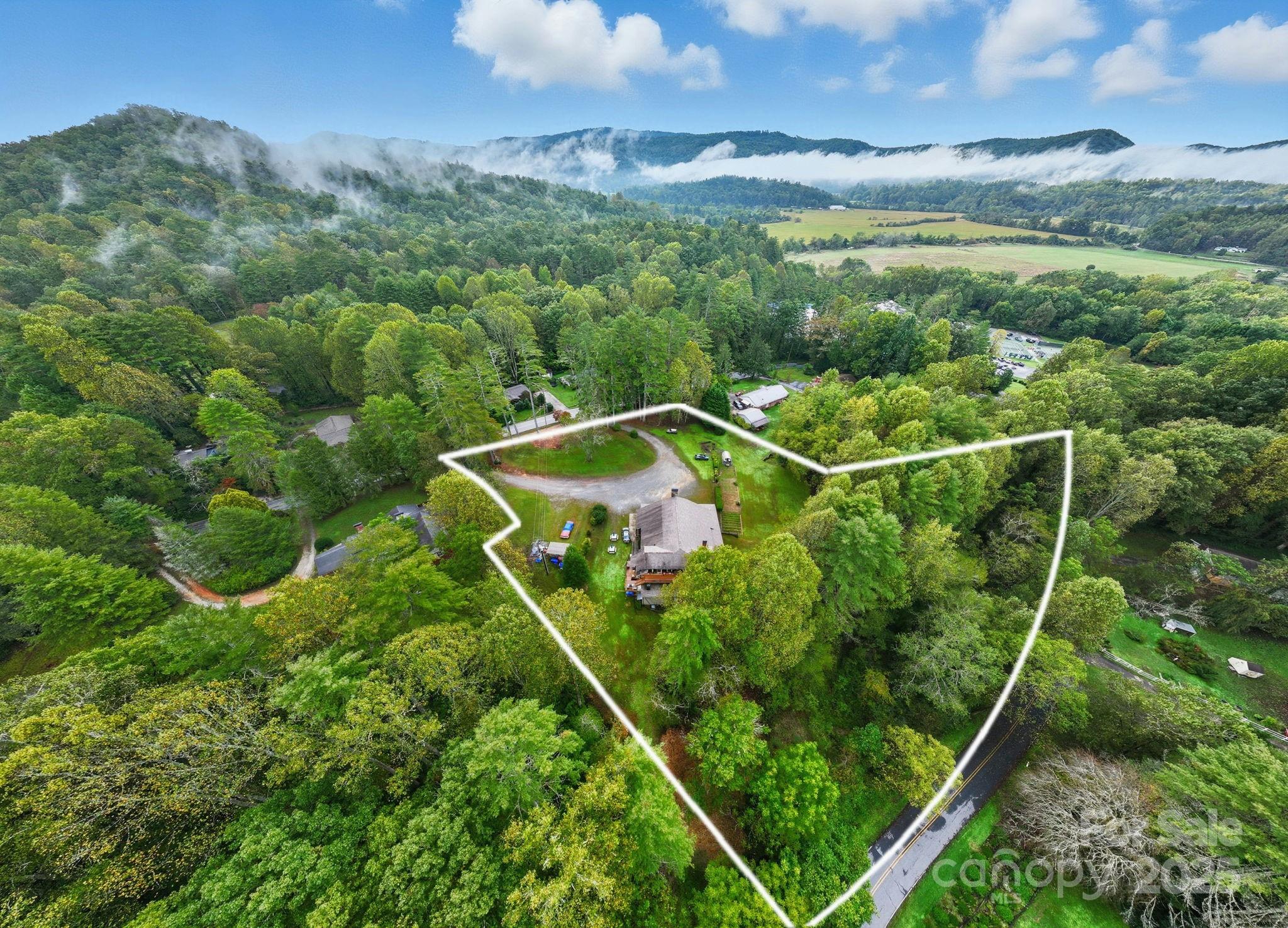 1196 North Country Club Road Brevard, NC 28712 - Photo 21 of 48 a view of a tennis court