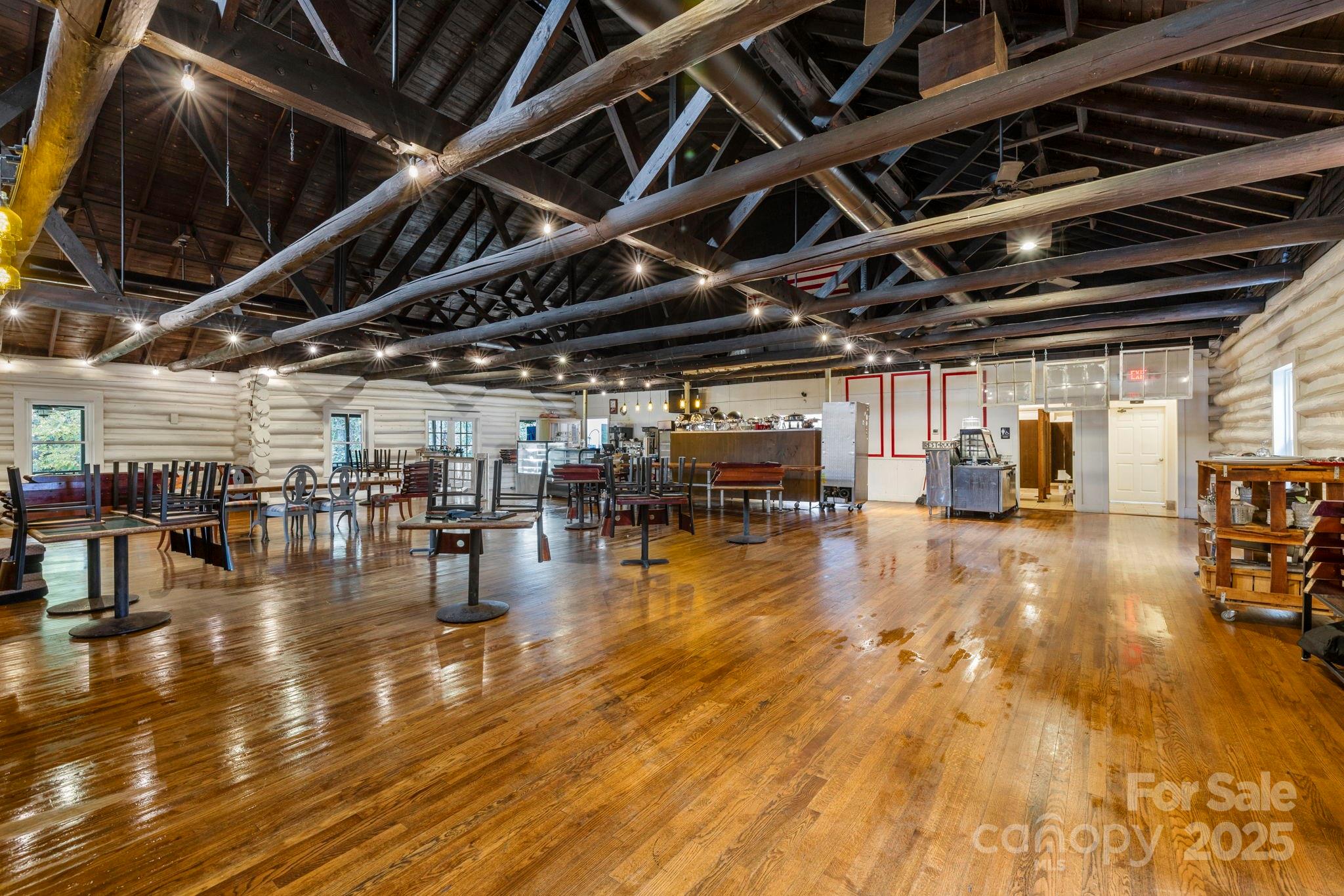 1196 North Country Club Road Brevard, NC 28712 - Photo 3 of 48 a view of a room with wooden floor