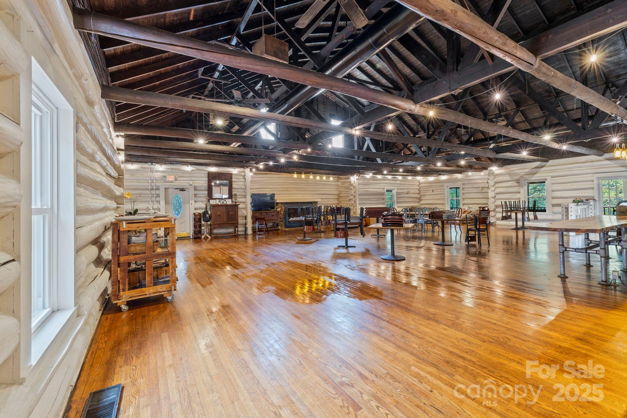 1196 North Country Club Road Brevard, NC 28712 - Photo 4 of 48 a view of a room with wooden floor