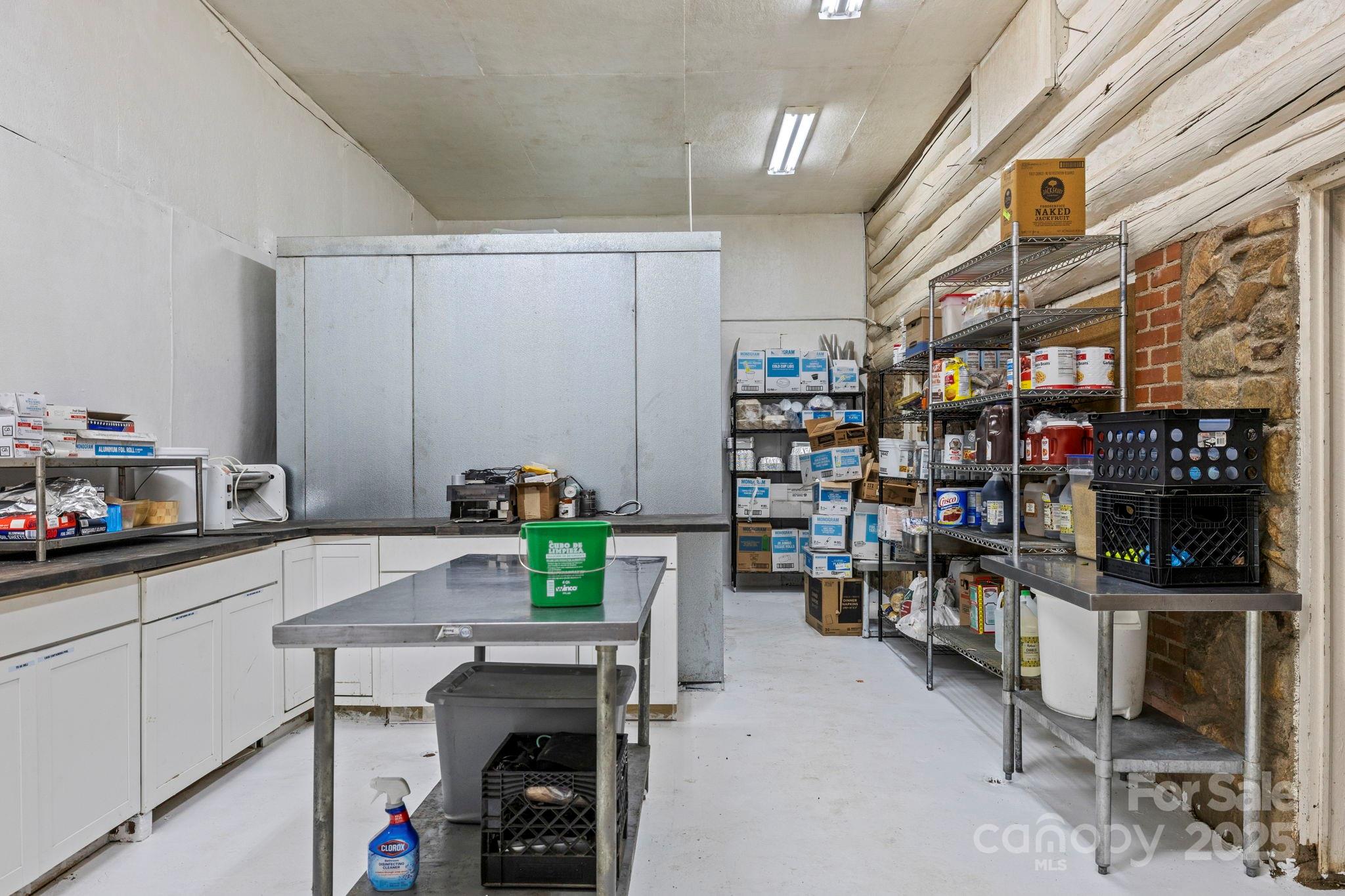 1196 North Country Club Road Brevard, NC 28712 - Photo 42 of 48 a room with storage and furniture