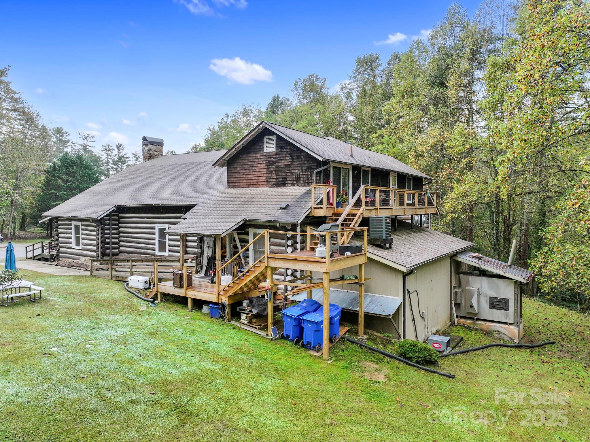1196 North Country Club Road Brevard, NC 28712 - Photo 44 of 48 a front view of a house with garden