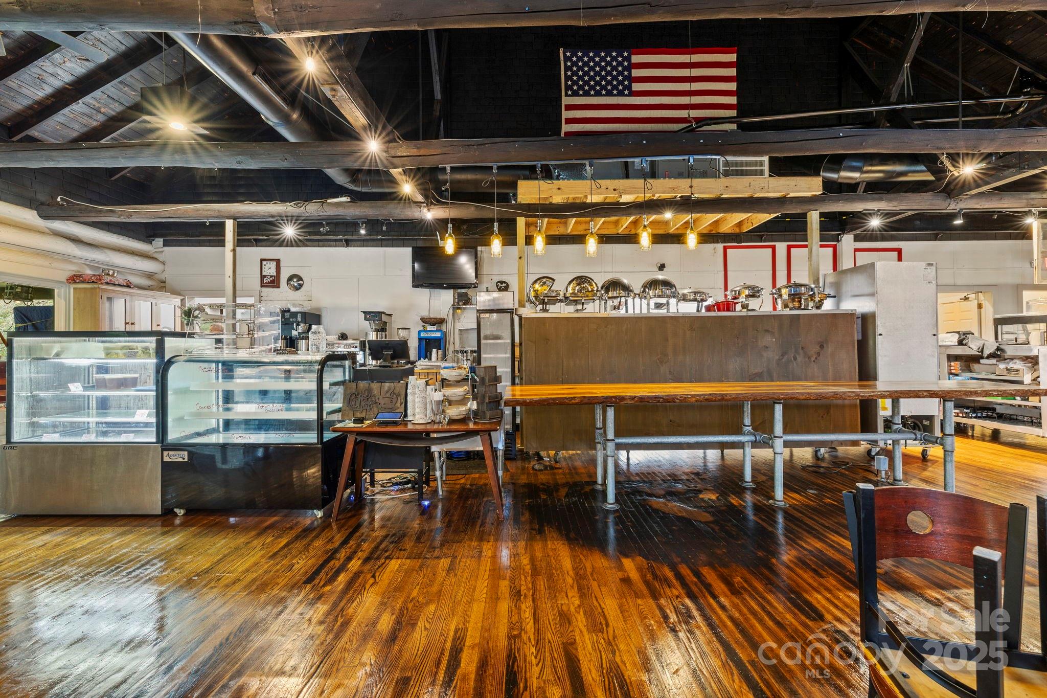 1196 North Country Club Road Brevard, NC 28712 - Photo 10 of 48 a view of a swimming pool with seating space