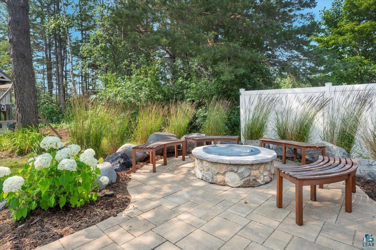 1323 South Ridge Road Duluth, MN 55804 - Photo 29 of 31 View of patio / terrace featuring a fire pit