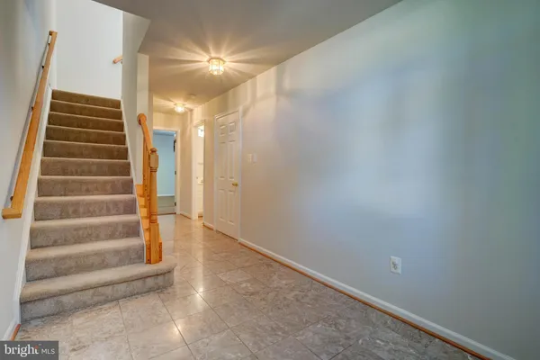 a view of an entryway with staircase