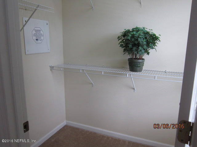 706 Crystal Way Orange Park, FL 32065 - Photo 20 of 31 a close view of walk in closet