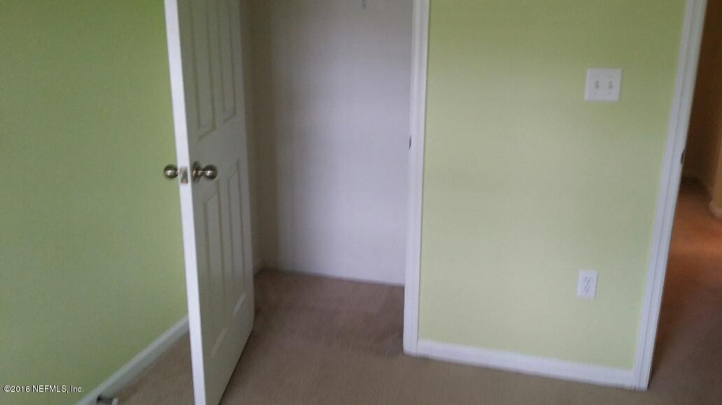 706 Crystal Way Orange Park, FL 32065 - Photo 28 of 31 a view of a hallway