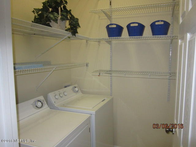 706 Crystal Way Orange Park, FL 32065 - Photo 30 of 31 a utility room with dryer and washer
