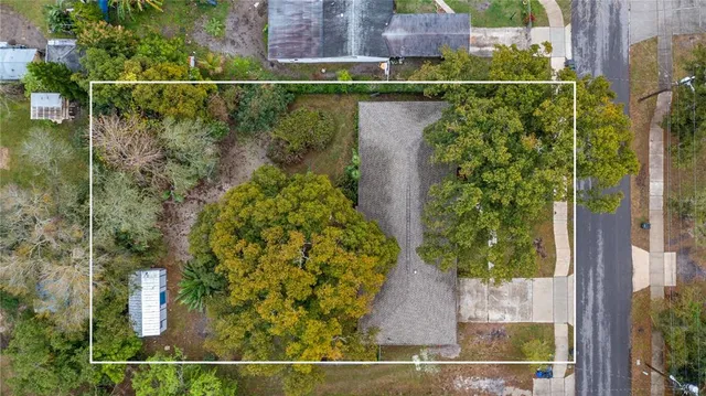 an aerial view of beach and swimming pool