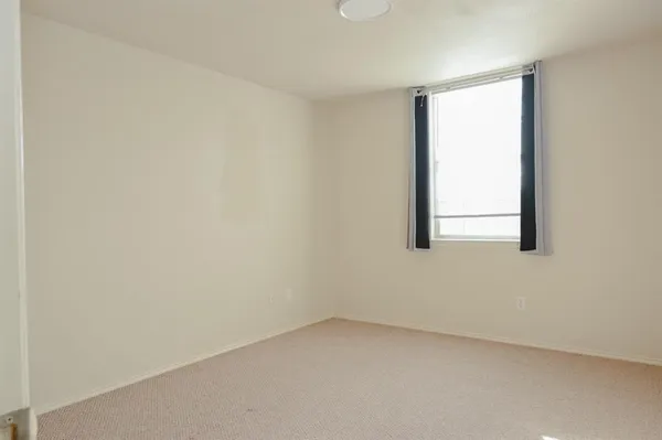 a view of a small space with a window