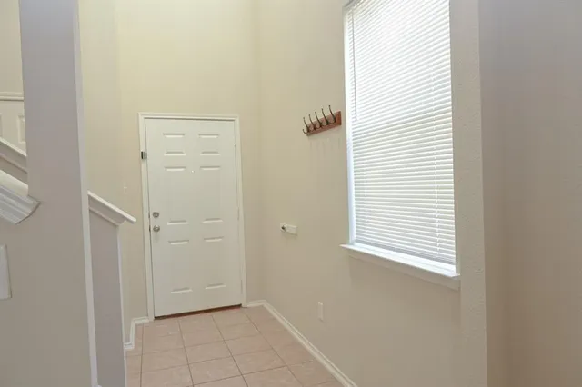 a view of a bathroom with a window