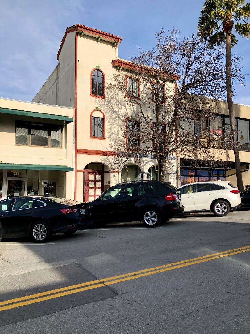 a car parked in front of a house