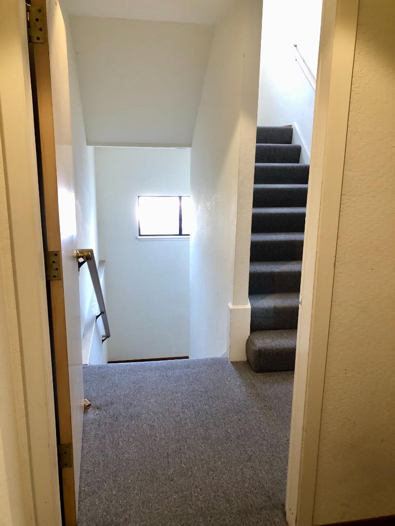 210-4 Broadway Millbrae, CA 94030 - Photo 14 of 15 a view of an entryway with staircase