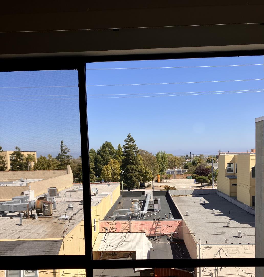 210-4 Broadway Millbrae, CA 94030 - Photo 5 of 15 a view of a balcony with wooden floor