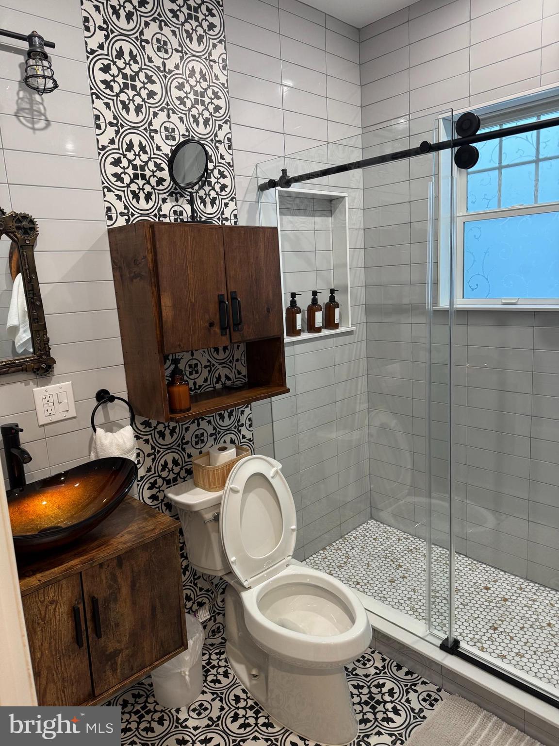 814 Chestnut Street Reading, PA 19602 - Photo 3 of 13 a bathroom with a sink toilet and shower