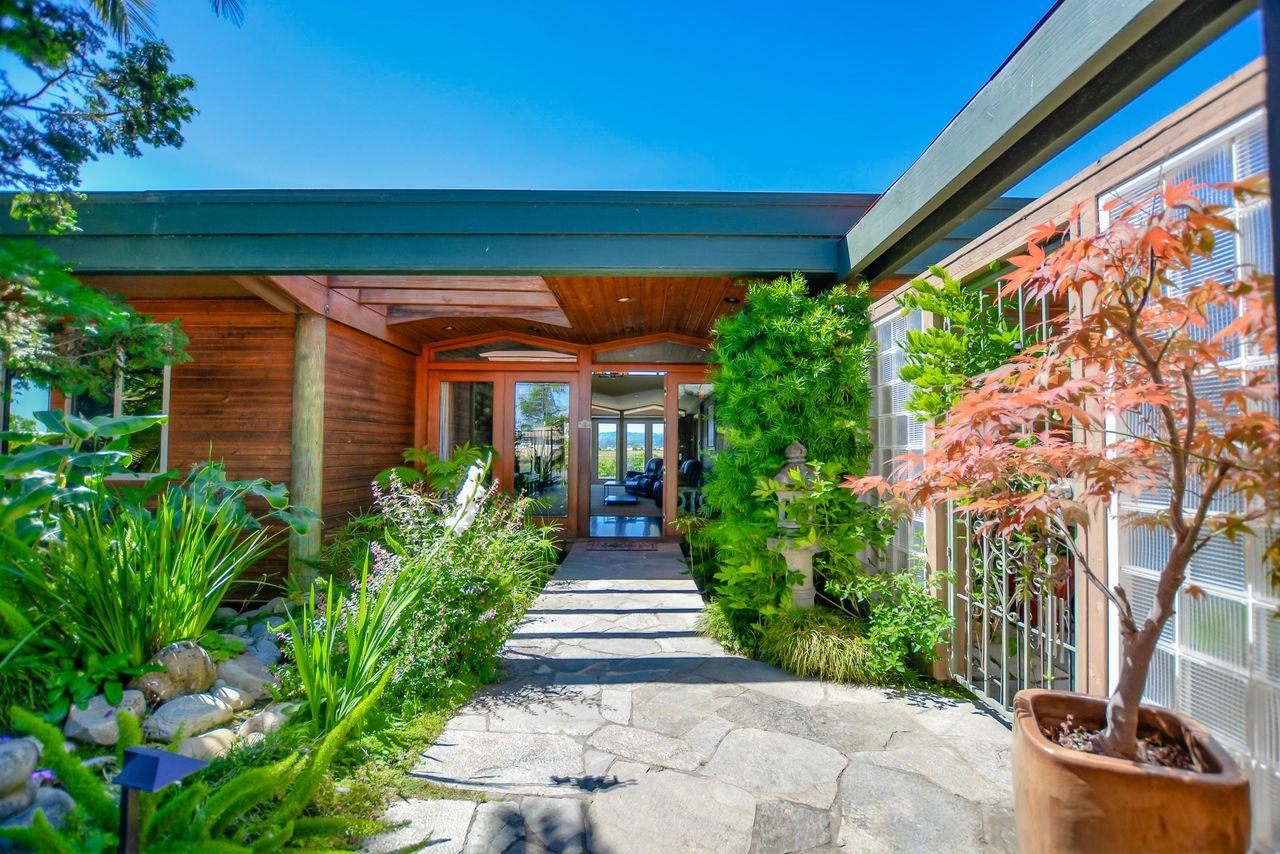 149 Cutter Drive Watsonville, CA 95076 - Photo 12 of 49 a front view of a house with plants and garden