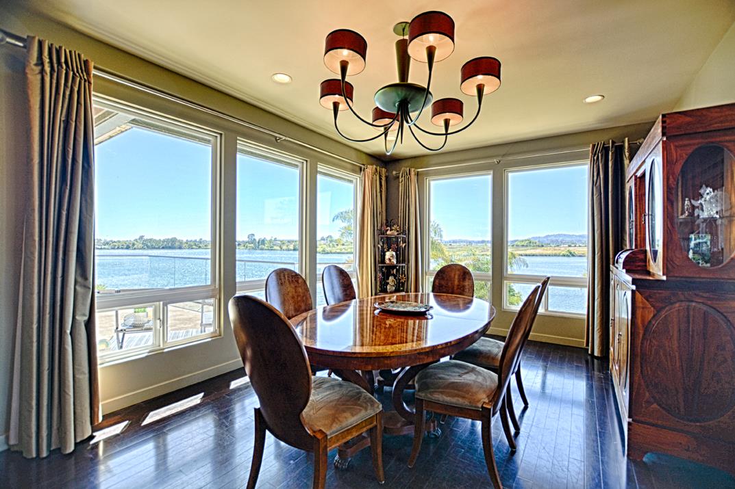 149 Cutter Drive Watsonville, CA 95076 - Photo 26 of 49 a view of a dining room with furniture window and wooden floor