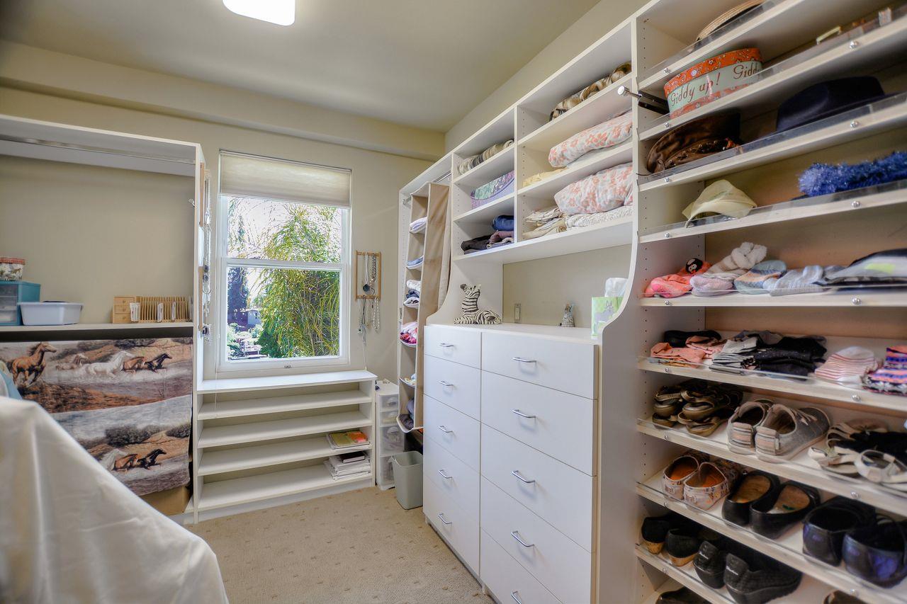 149 Cutter Drive Watsonville, CA 95076 - Photo 34 of 49 a view of walk in closet with clothes and shoes