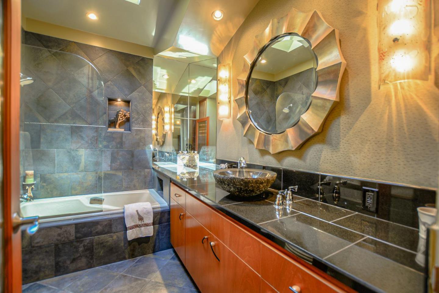 149 Cutter Drive Watsonville, CA 95076 - Photo 38 of 49 a bathroom with a sink and a mirror