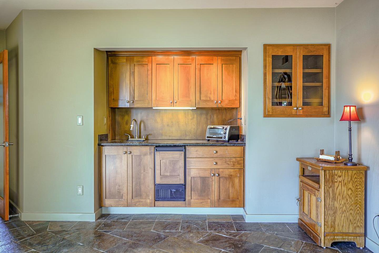 149 Cutter Drive Watsonville, CA 95076 - Photo 47 of 49 a kitchen with granite countertop cabinets and window