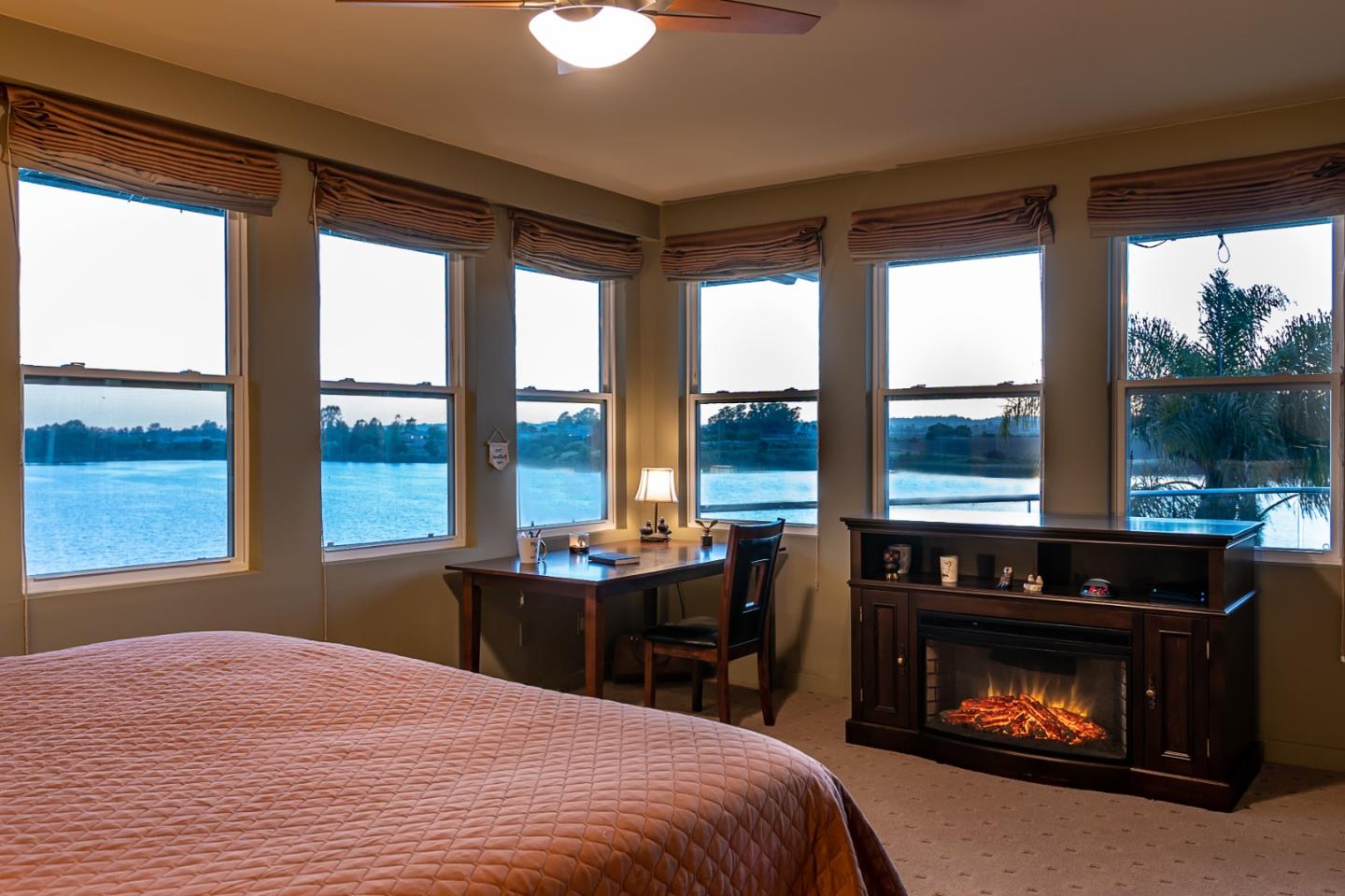 149 Cutter Drive Watsonville, CA 95076 - Photo 9 of 49 a bed room with a balcony a bed and a fireplace