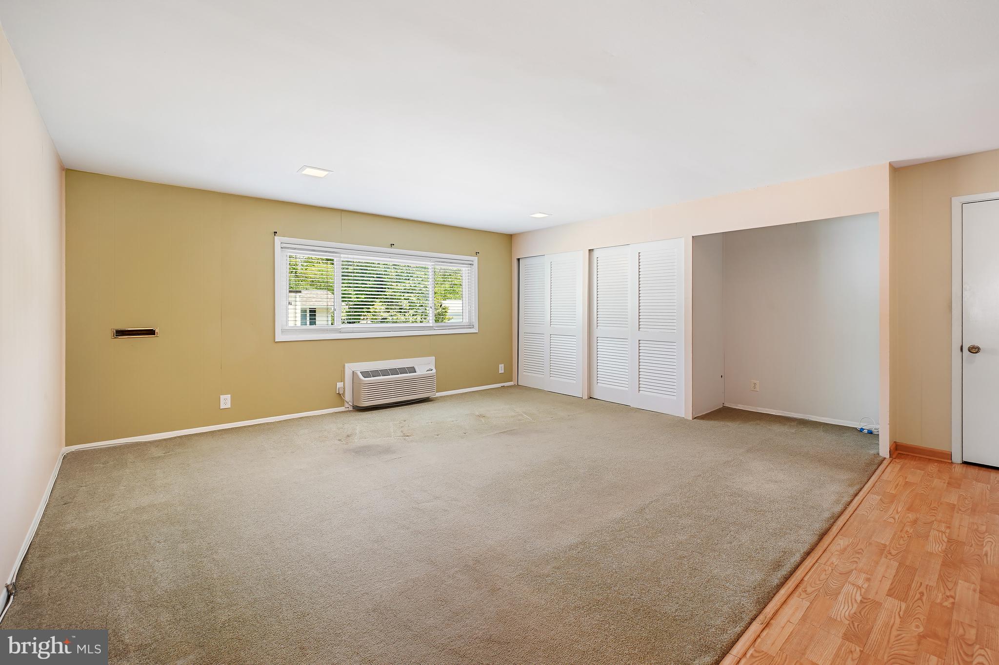 14550 Kelmscot Drive, Unit 186A Silver Spring, MD 20906 - Photo 16 of 29 a view of an empty room with a window
