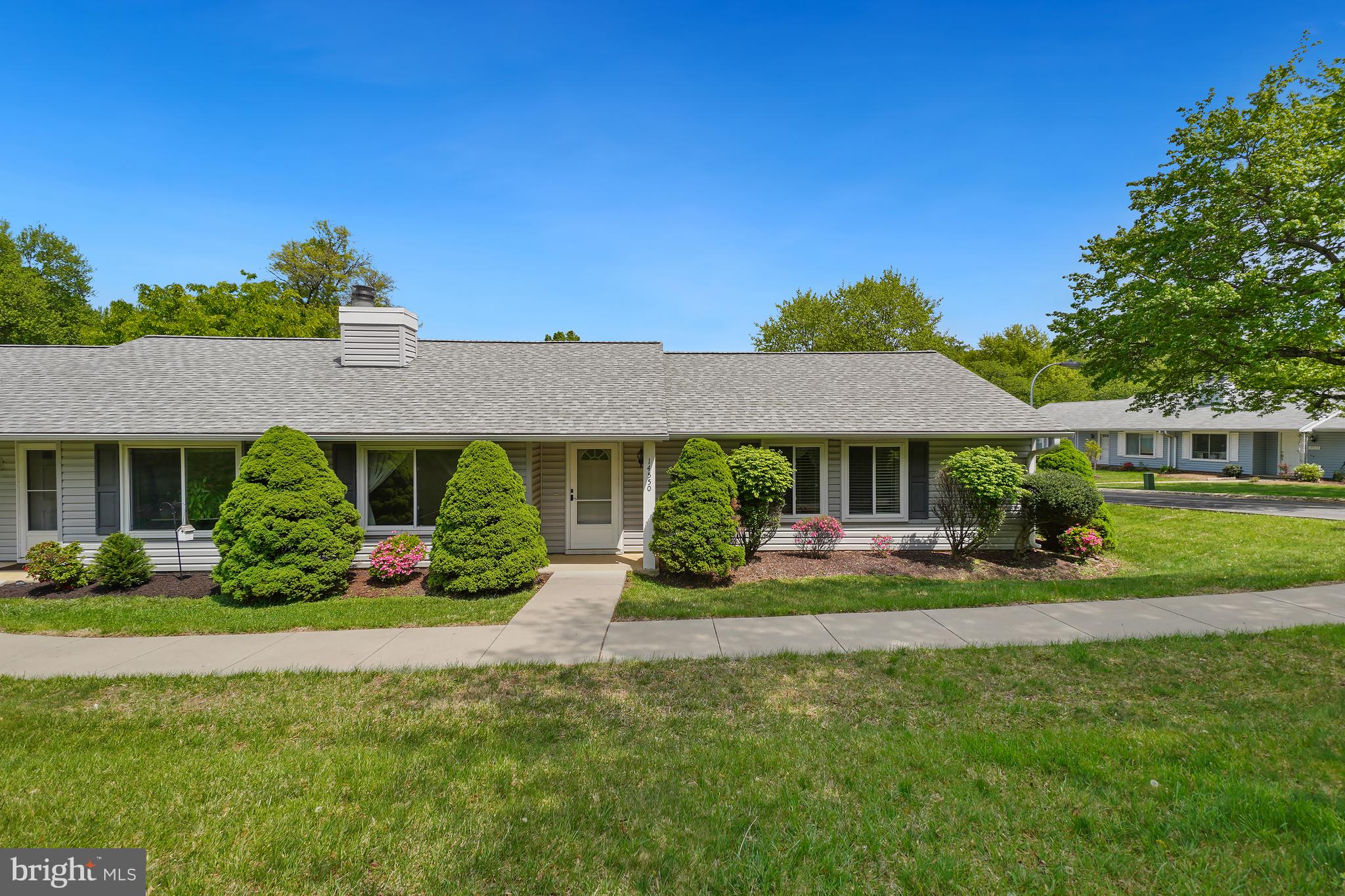 14550 Kelmscot Drive, Unit 186A Silver Spring, MD 20906 - Photo 2 of 29 a front view of a house with a yard
