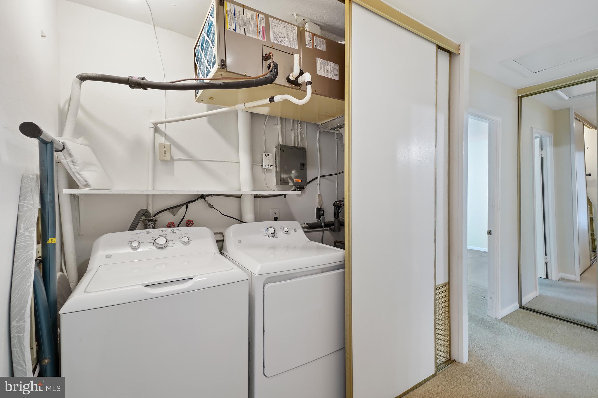 14550 Kelmscot Drive, Unit 186A Silver Spring, MD 20906 - Photo 26 of 29 a utility room with dryer and washer