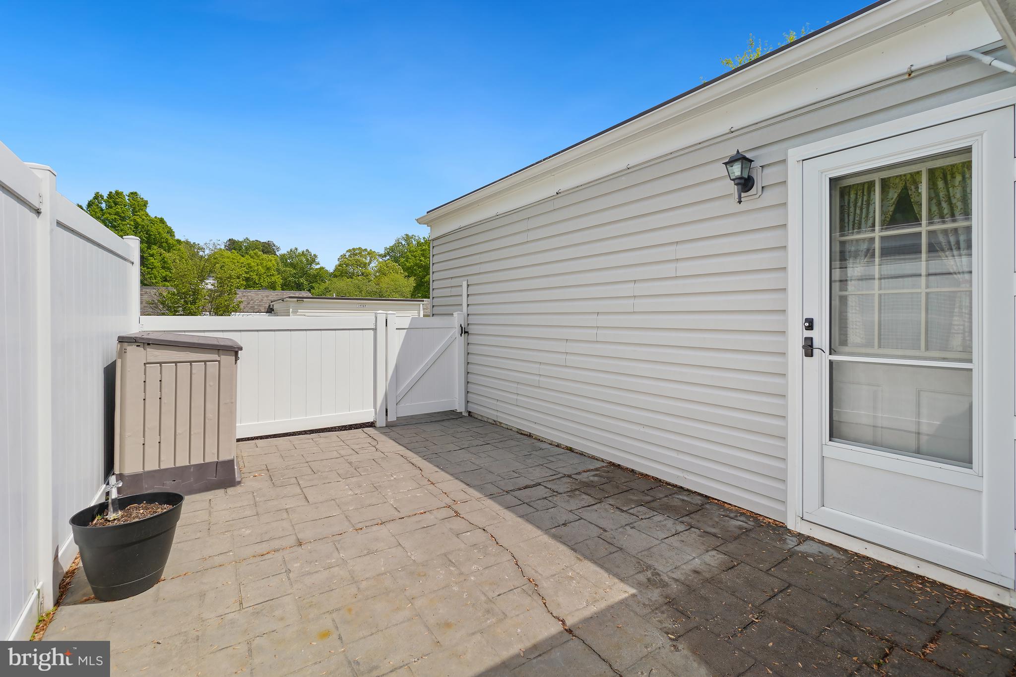 14550 Kelmscot Drive, Unit 186A Silver Spring, MD 20906 - Photo 27 of 29 a view of a house with a yard