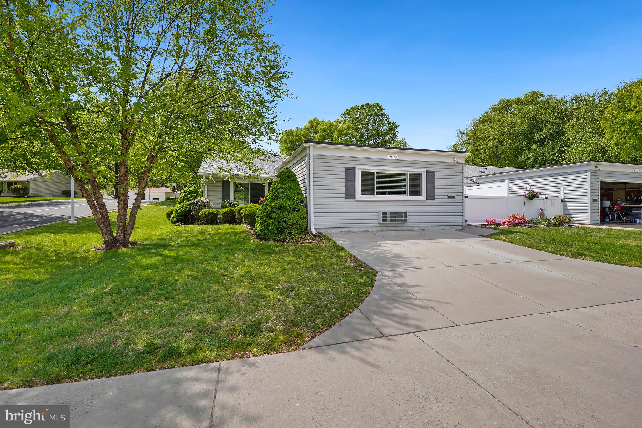 14550 Kelmscot Drive, Unit 186A Silver Spring, MD 20906 - Photo 29 of 29 a front view of house with yard and green space