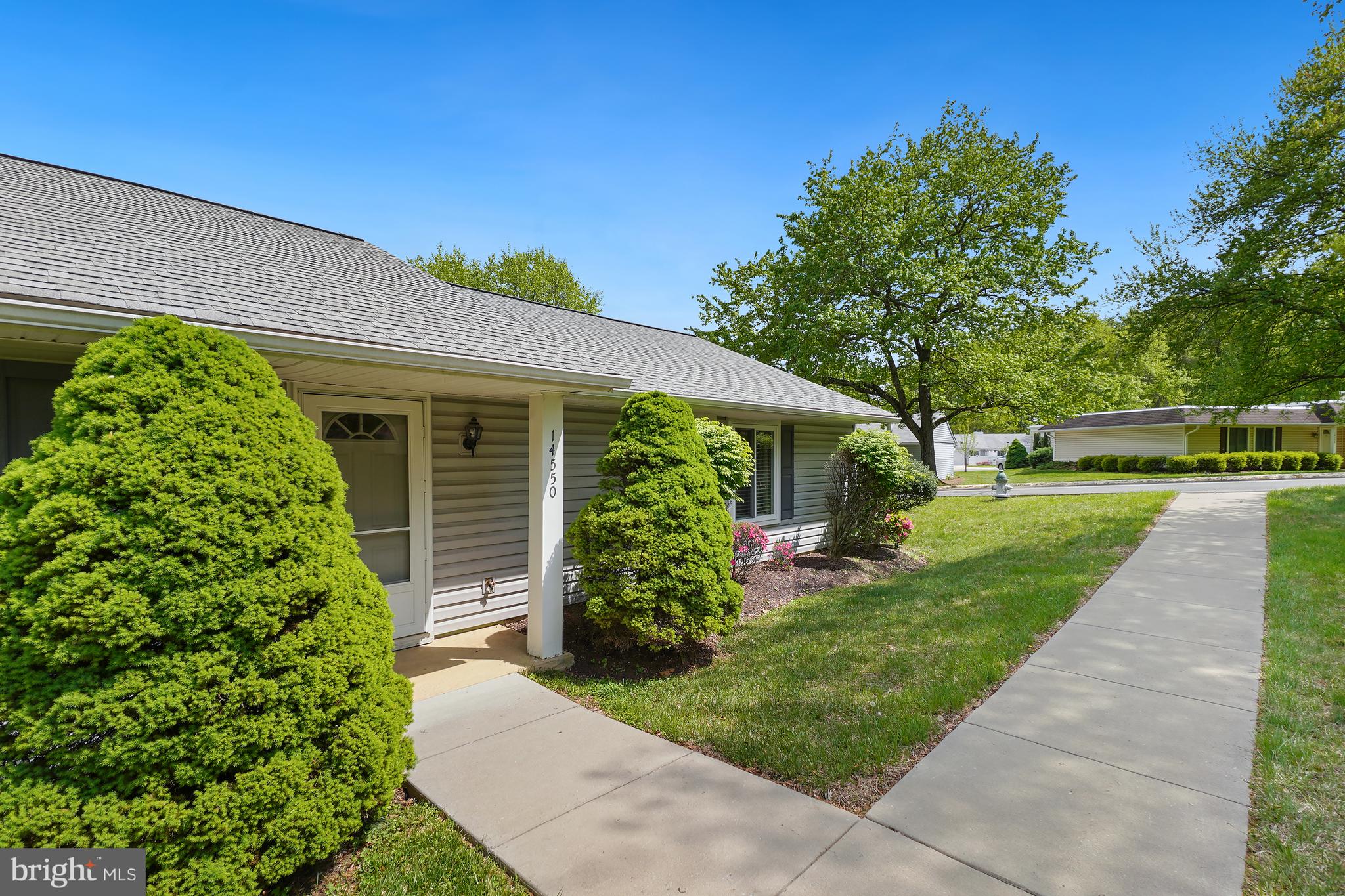14550 Kelmscot Drive, Unit 186A Silver Spring, MD 20906 - Photo 3 of 29 front view of a house with a yard
