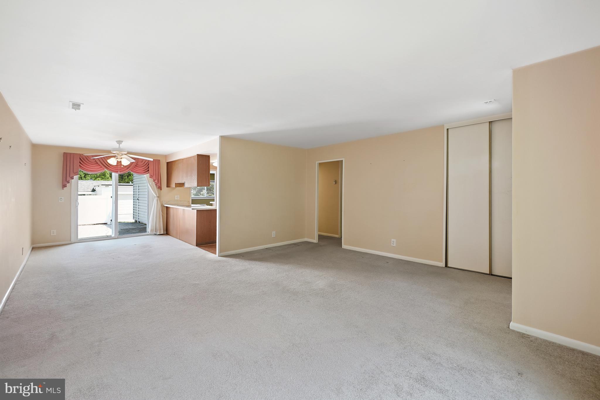 14550 Kelmscot Drive, Unit 186A Silver Spring, MD 20906 - Photo 8 of 29 a view of a livingroom with a kitchen