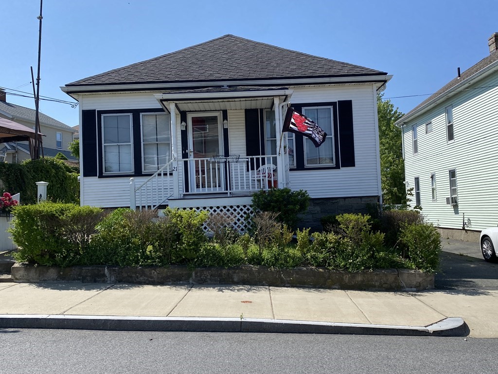 21 Trevalley Road Revere, MA 02151 - Photo 1 of 9 a front view of a house with yard