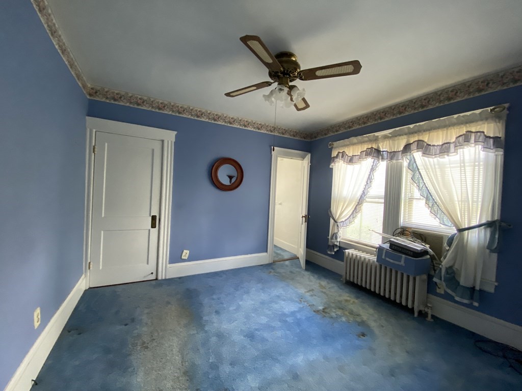 21 Trevalley Road Revere, MA 02151 - Photo 3 of 9 a view of an empty room and window