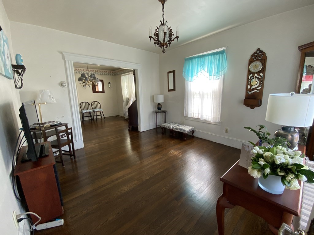 21 Trevalley Road Revere, MA 02151 - Photo 7 of 9 a view of a livingroom with furniture window and wooden floor