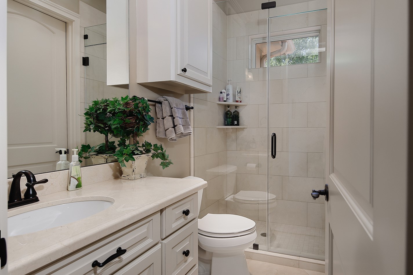 2 Lace Point The Woodlands, TX 77382 - Photo 24 of 48 a bathroom with a sink toilet and shower