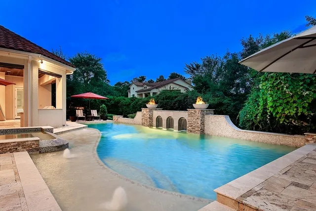 a view of a backyard with a patio