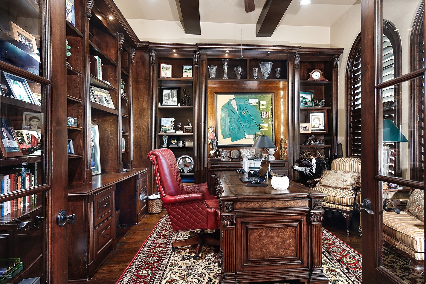 2 Lace Point The Woodlands, TX 77382 - Photo 8 of 48 a living room with furniture a bookshelf and a window